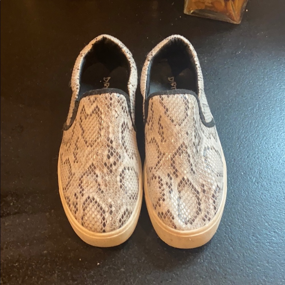Snakeskin slip-on shoes